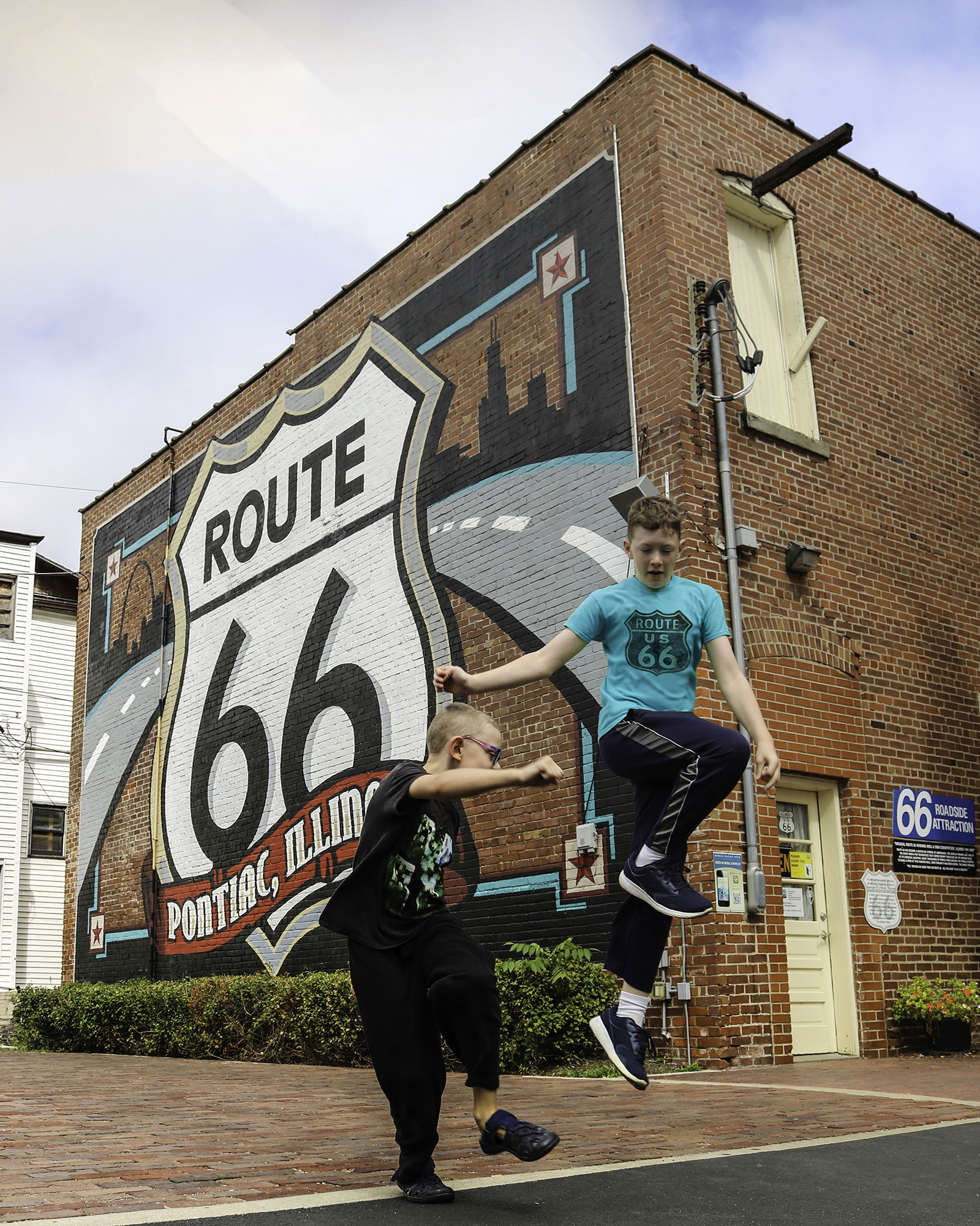 Murals on Main Street Featuring the World's Largest Outdoor Painted Route 66 Shield